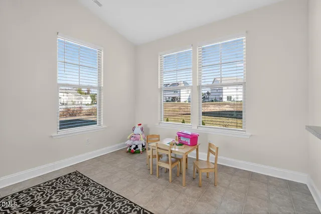a dining room with a window