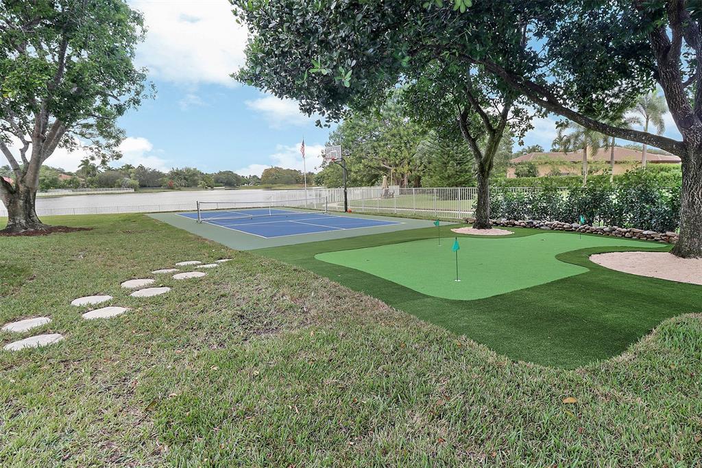 10303 Southwest 26th Street Davie, FL 33324 - Photo 2 of 35 a view of a field with sitting area