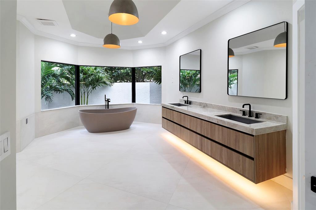 10303 Southwest 26th Street Davie, FL 33324 - Photo 23 of 35 a large white room with a large window and a sink