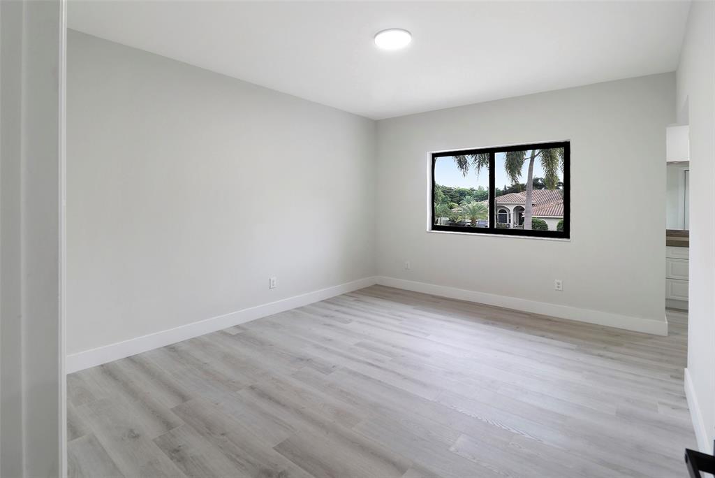 10303 Southwest 26th Street Davie, FL 33324 - Photo 29 of 35 an empty room with a window