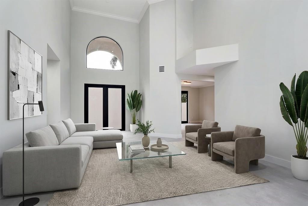 10303 Southwest 26th Street Davie, FL 33324 - Photo 9 of 35 a living room with furniture and a large window