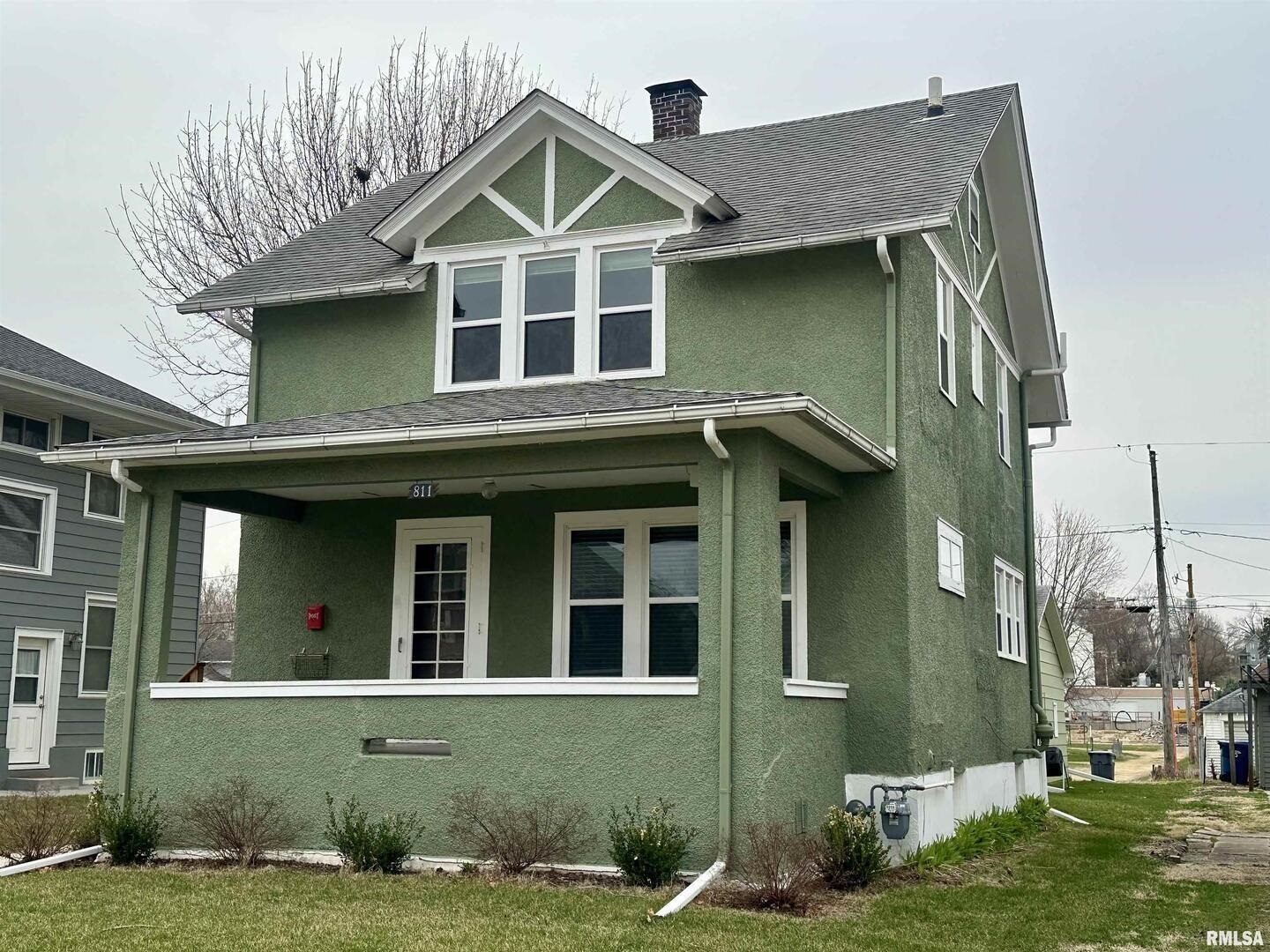 811 7th Avenue South Clinton, IA 52732 - Photo 23 of 27 a front view of a house with a yard