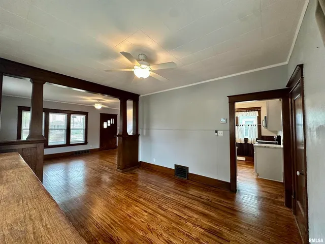 a view of cabinets with wooden floor