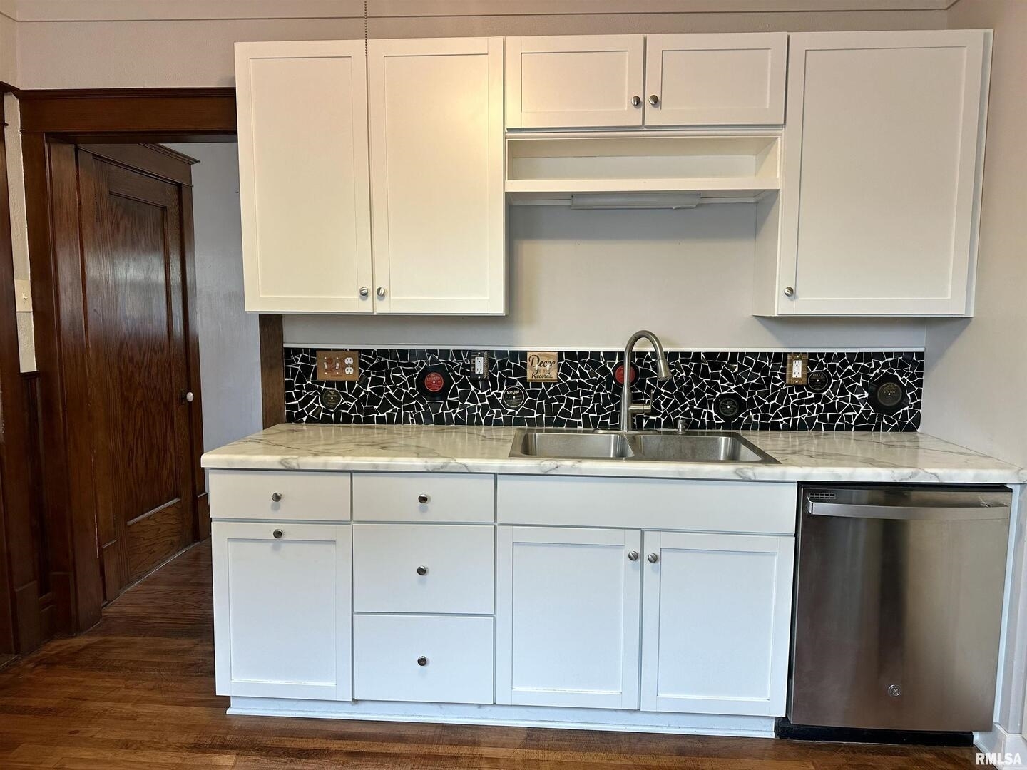 811 7th Avenue South Clinton, IA 52732 - Photo 10 of 27 a view of cabinets with wooden floor