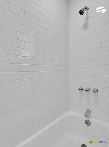 a bathroom with a bathtub