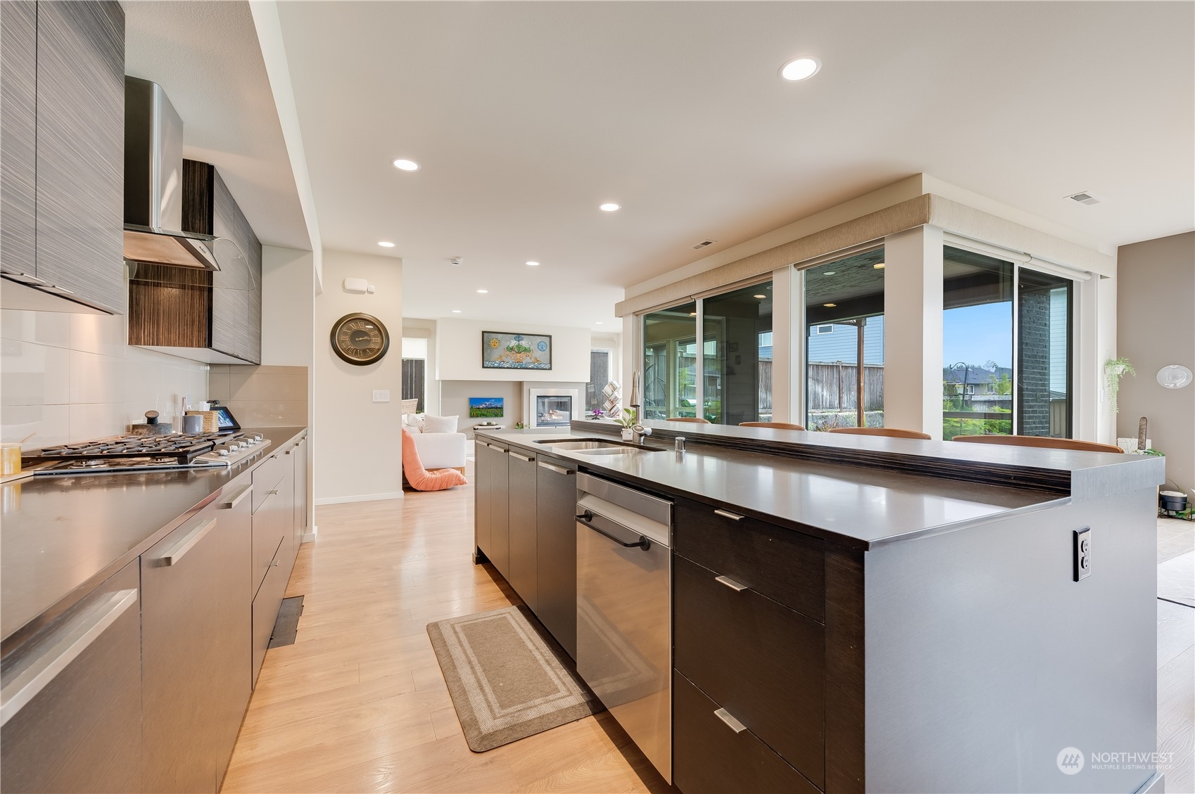 4016 171st Street Southeast Bothell, WA 98012 - Photo 13 of 39 a kitchen with stainless steel appliances granite countertop a stove and a sink
