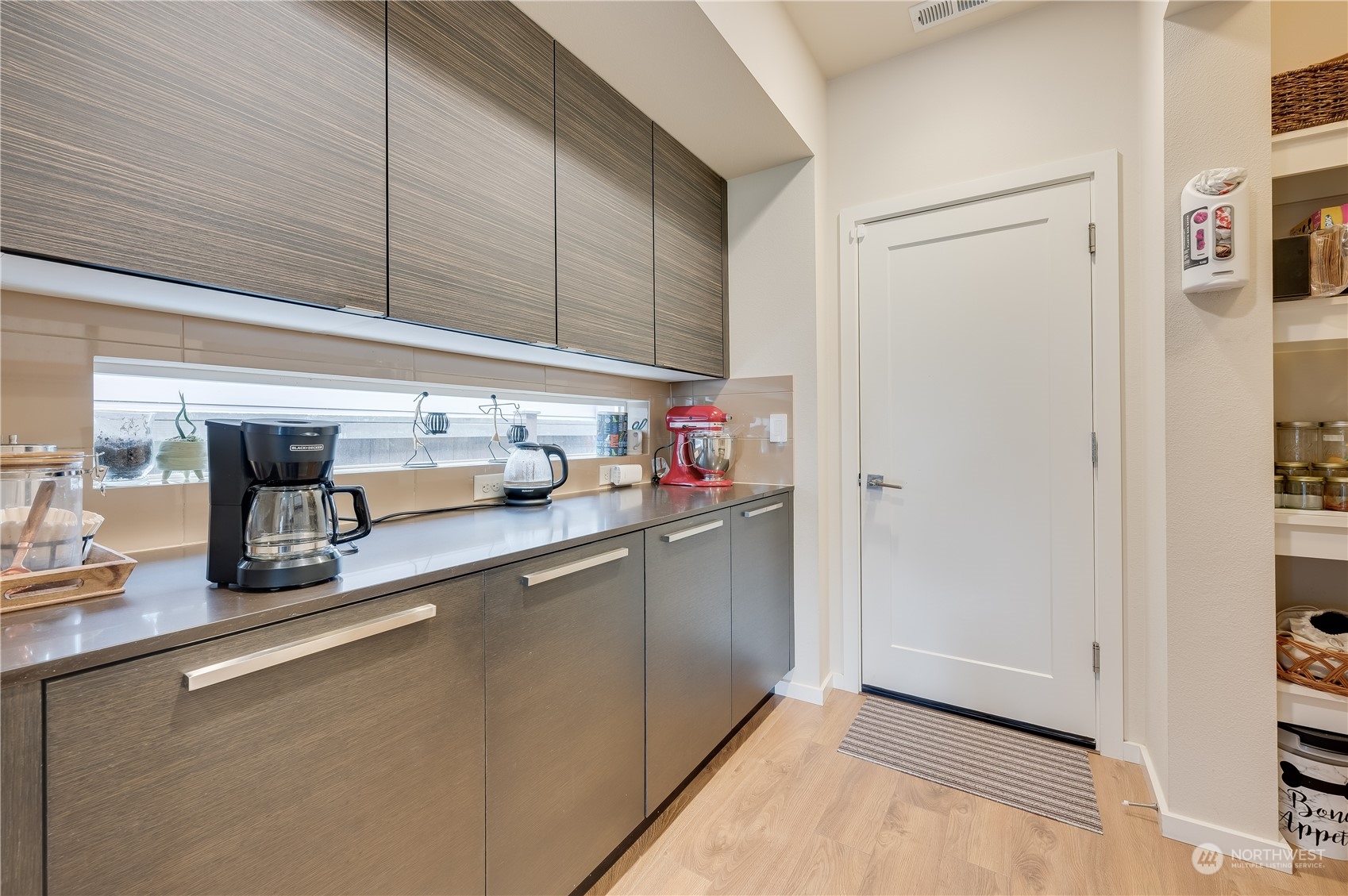4016 171st Street Southeast Bothell, WA 98012 - Photo 16 of 39 a kitchen with stainless steel appliances granite countertop a sink and a refrigerator