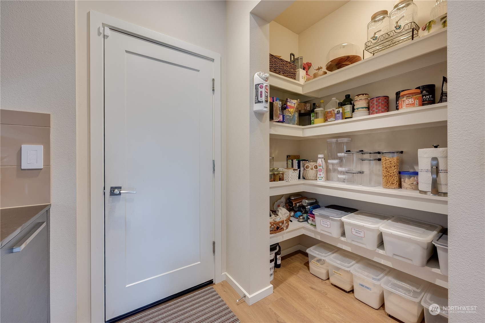 4016 171st Street Southeast Bothell, WA 98012 - Photo 17 of 39 a view of workspace with baby crib and wooden floor