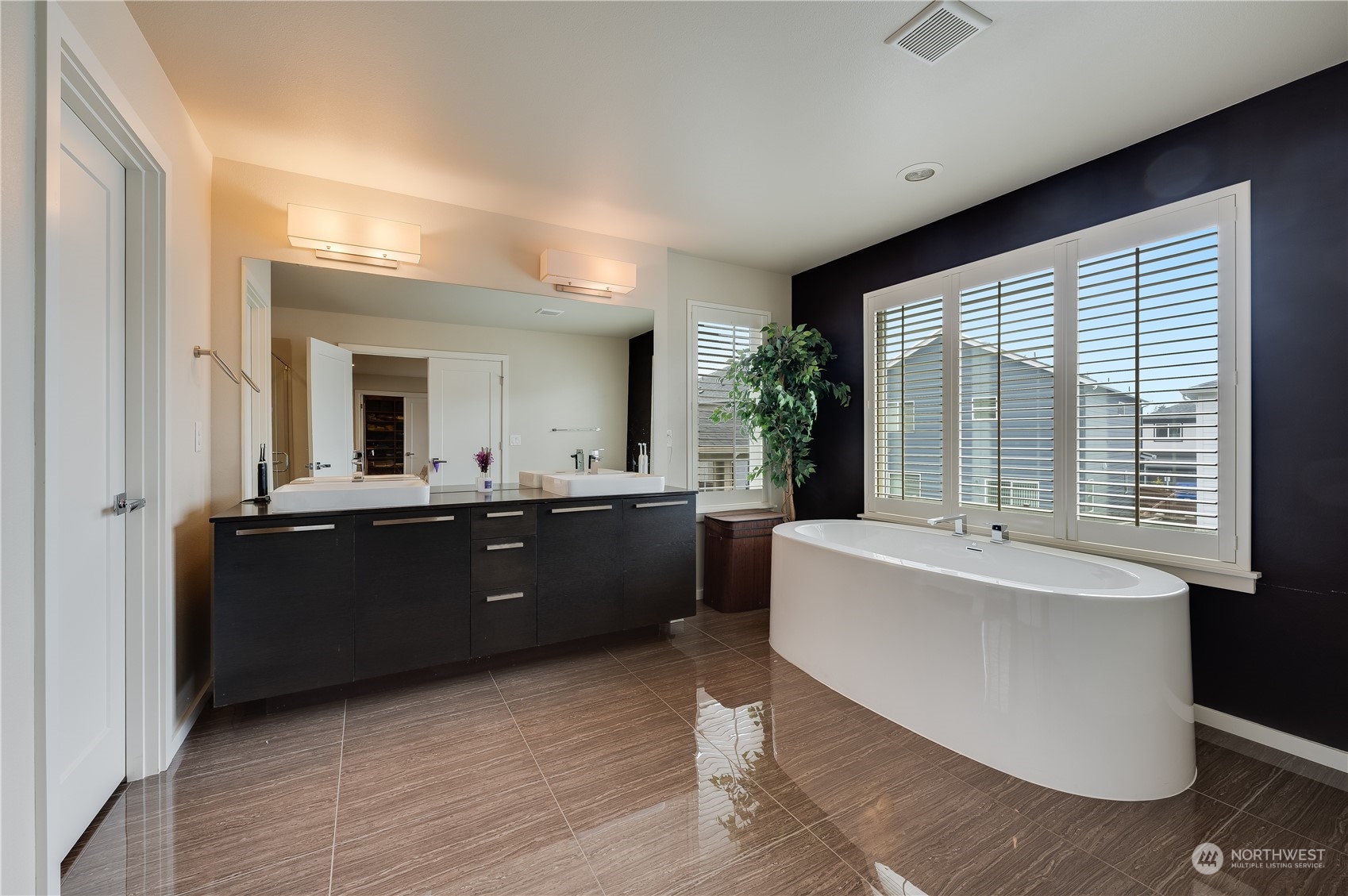 4016 171st Street Southeast Bothell, WA 98012 - Photo 26 of 39 a large bathroom with a large tub and sink