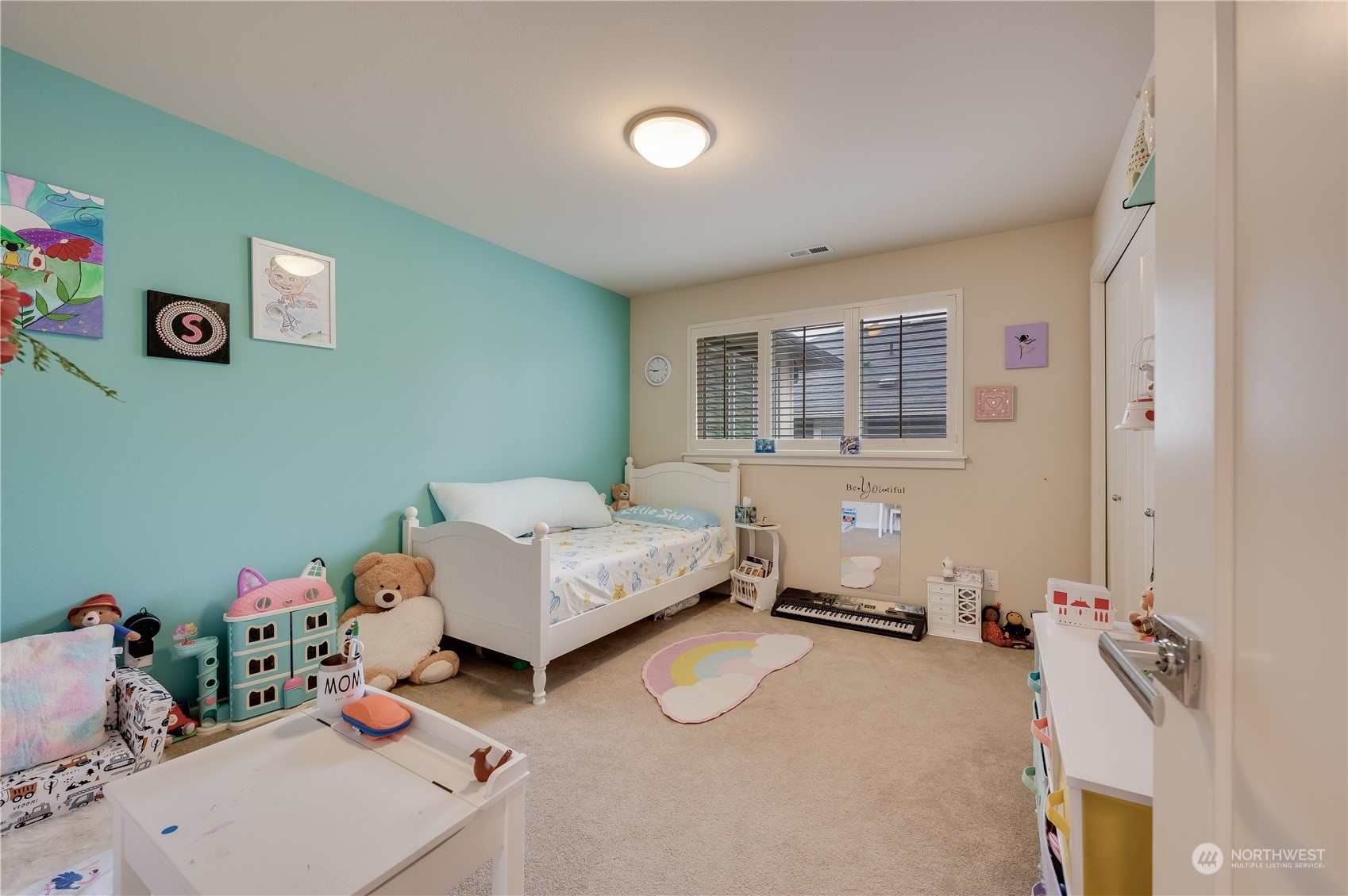 4016 171st Street Southeast Bothell, WA 98012 - Photo 29 of 39 a bedroom with furniture and a window
