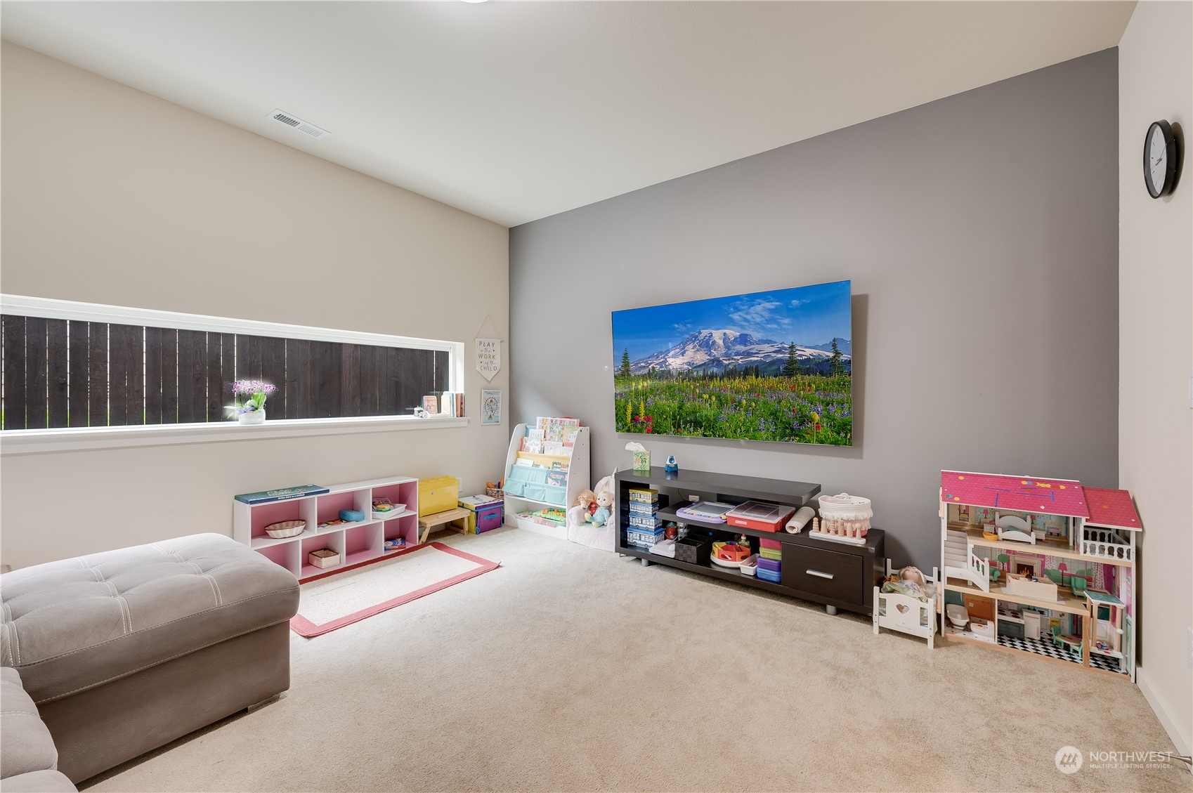 4016 171st Street Southeast Bothell, WA 98012 - Photo 6 of 39 a living room with furniture and a flat screen tv