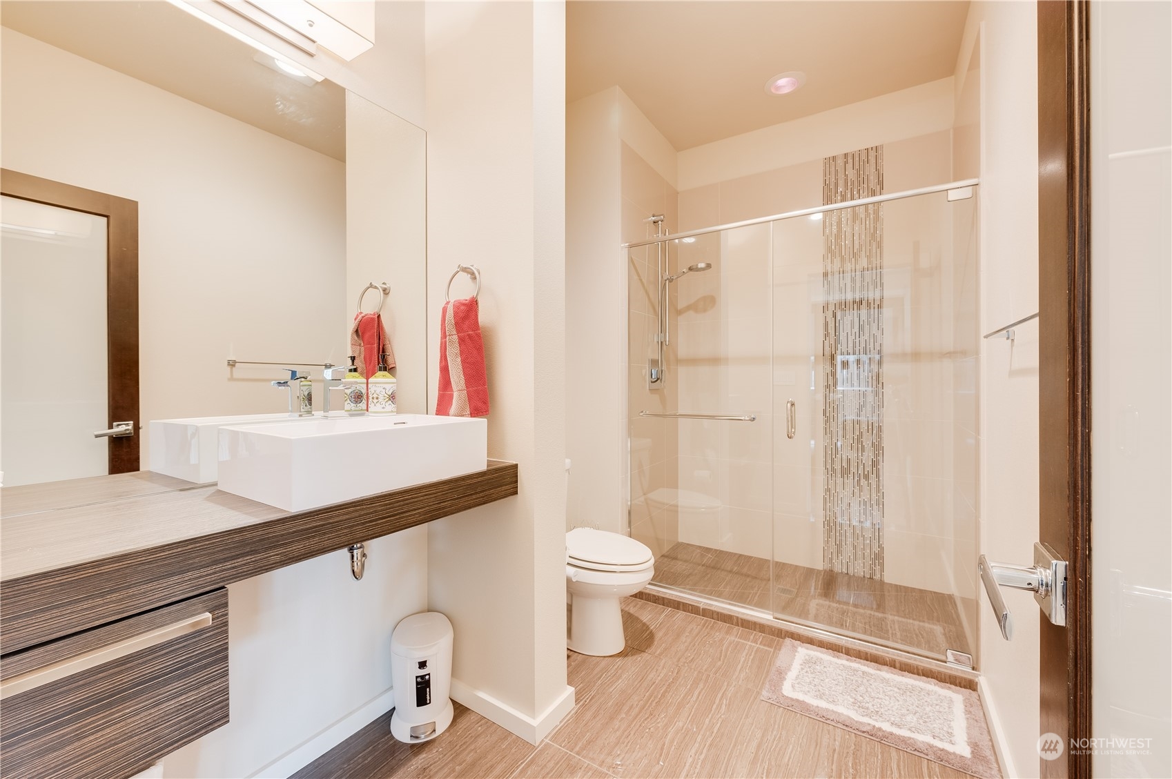 4016 171st Street Southeast Bothell, WA 98012 - Photo 7 of 39 a bathroom with a sink a toilet and shower