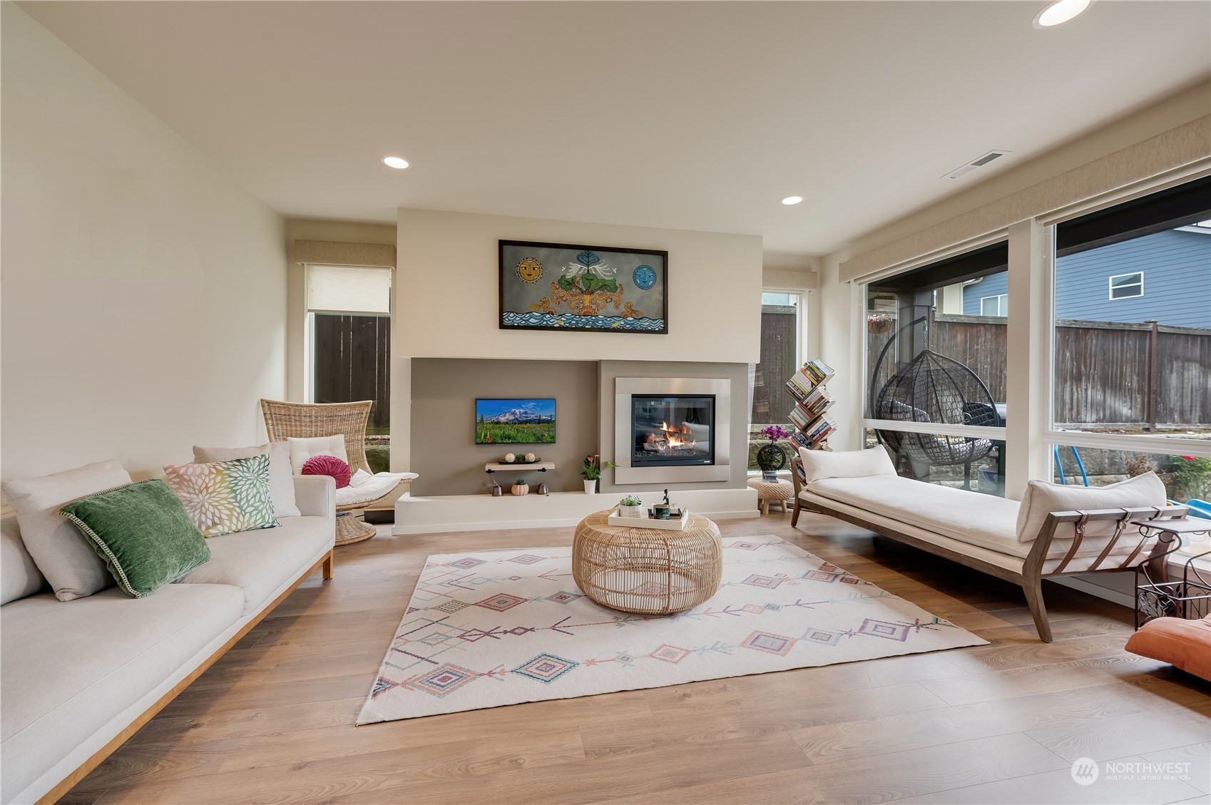 4016 171st Street Southeast Bothell, WA 98012 - Photo 8 of 39 a living room with furniture and a fireplace
