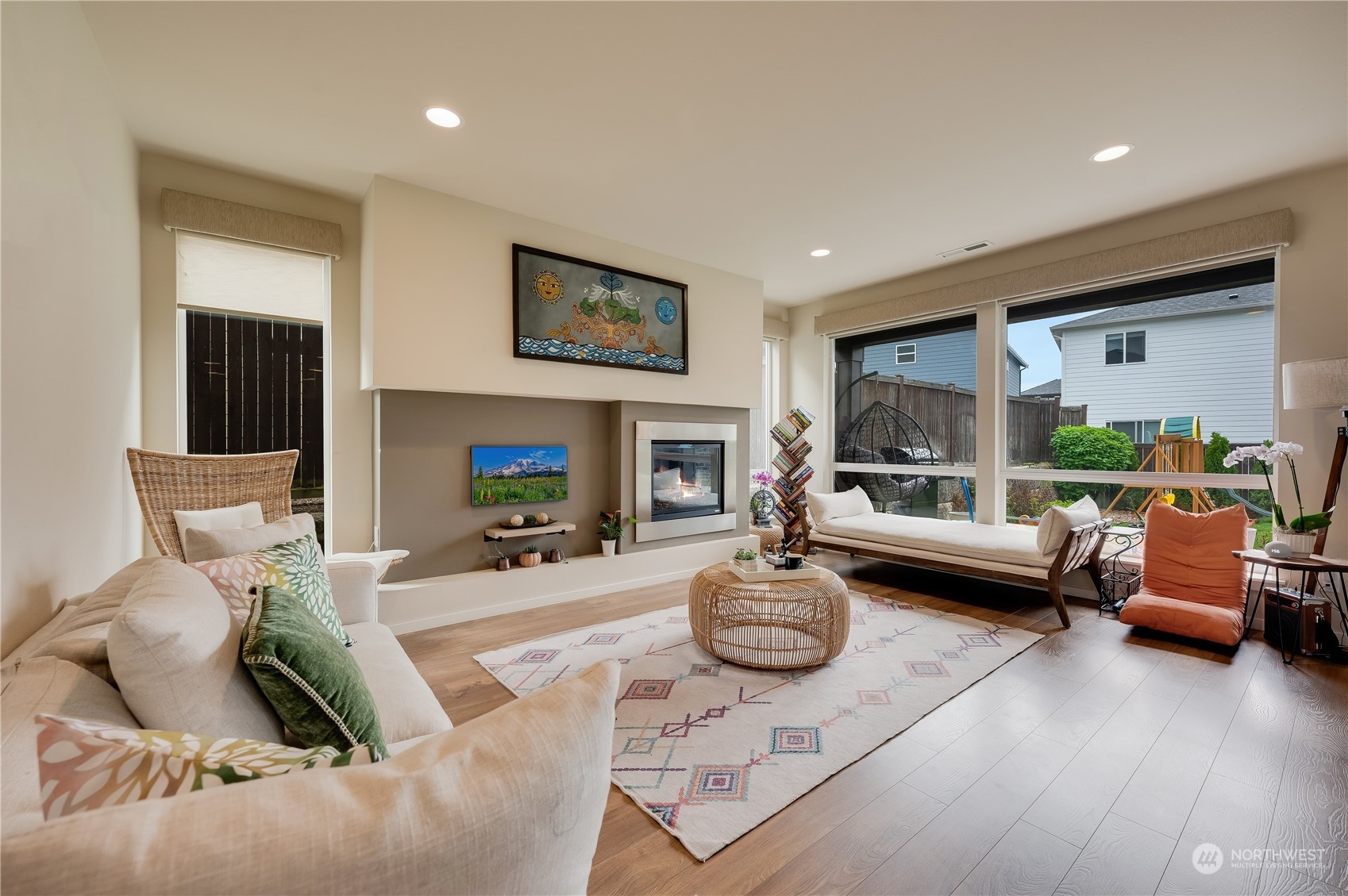 4016 171st Street Southeast Bothell, WA 98012 - Photo 9 of 39 a living room with furniture and a flat screen tv