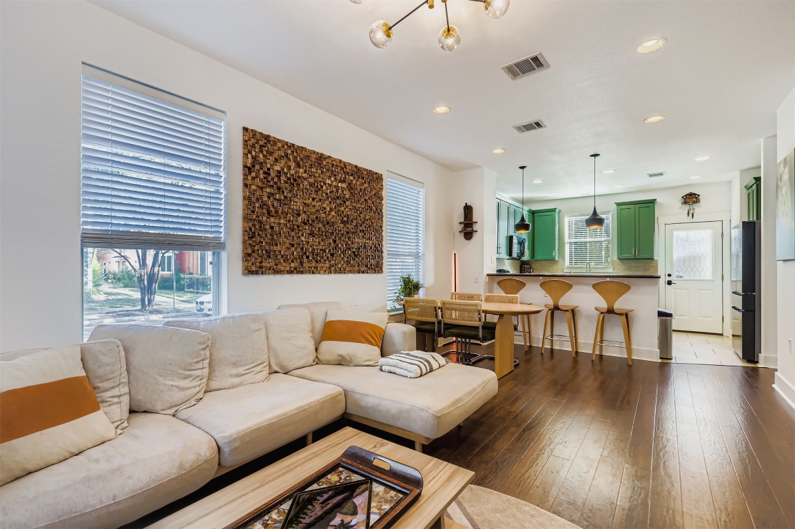 1601 Miriam Avenue, Unit 302 Austin, TX 78702 - Photo 4 of 29 Living area with recessed lighting and dark wood-style flooring