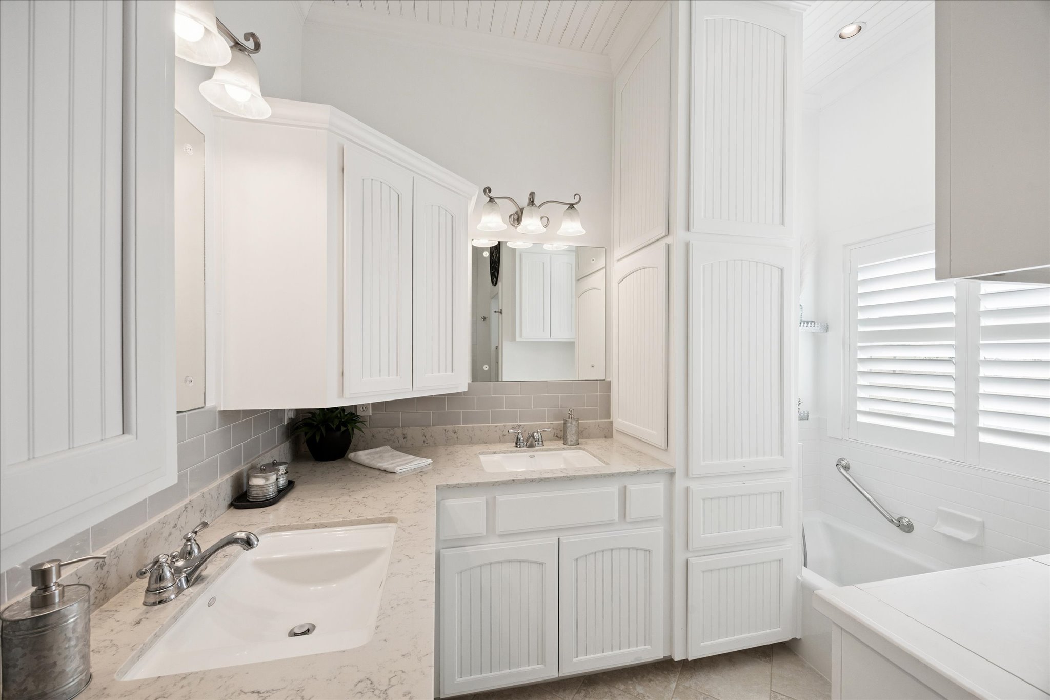 5100 Jaeger Road Burton, TX 77835 - Photo 18 of 34 Full bathroom featuring double vanity, backsplash, and ornamental molding