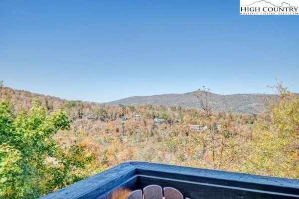 a view of a mountain from a balcony