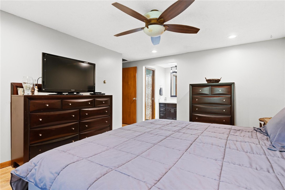 1940 Armstrong Road Fairborn, OH 45324 - Photo 33 of 48 This serene bedroom offers a private retreat with convenient access to an en-suite bathroom.
