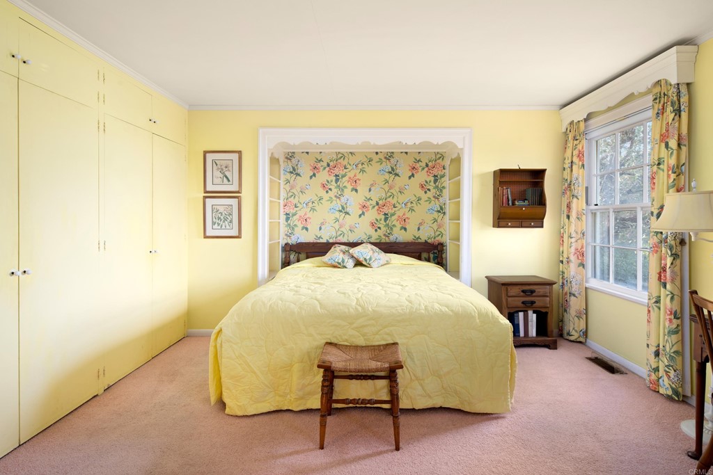 1380 Park Row La Jolla, CA 92037 - Photo 19 of 51 a bedroom with a bed and a window