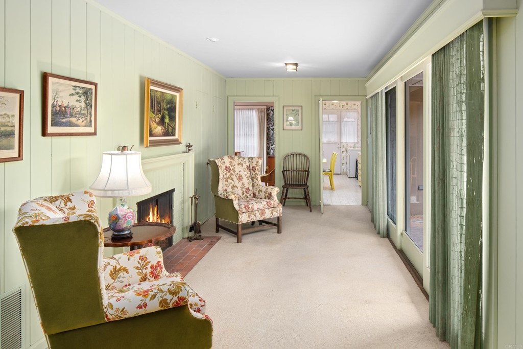 1380 Park Row La Jolla, CA 92037 - Photo 5 of 51 a living room with furniture and a fireplace