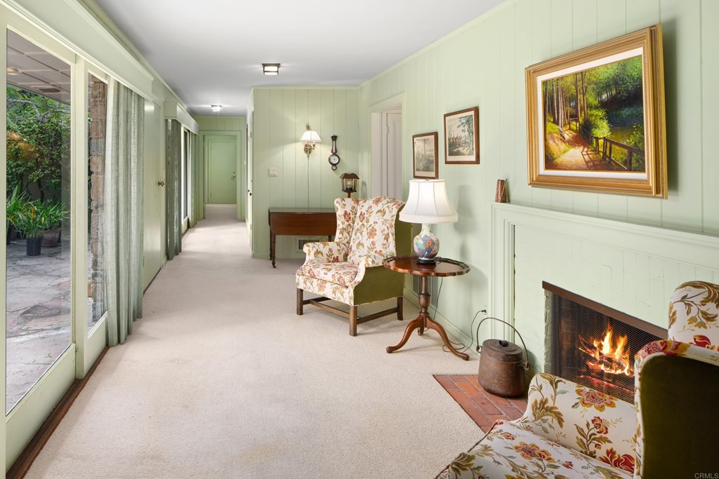 1380 Park Row La Jolla, CA 92037 - Photo 6 of 51 a living room with furniture and a fireplace