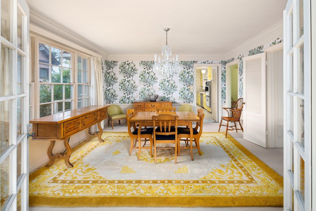 1380 Park Row La Jolla, CA 92037 - Photo 10 of 51 a view of a dining room with furniture window and wooden floor