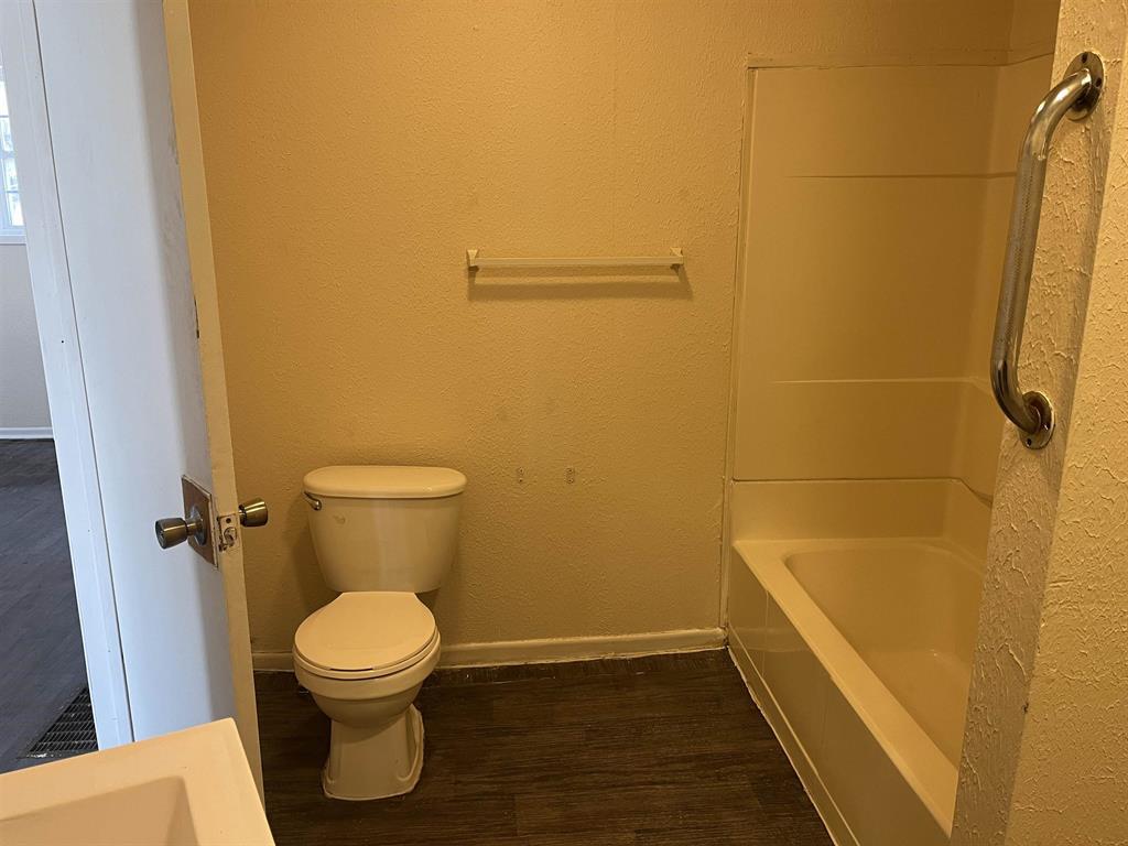 458 South Float Avenue Freeport, IL 61032 - Photo 10 of 11 a bathroom with a toilet and a shower