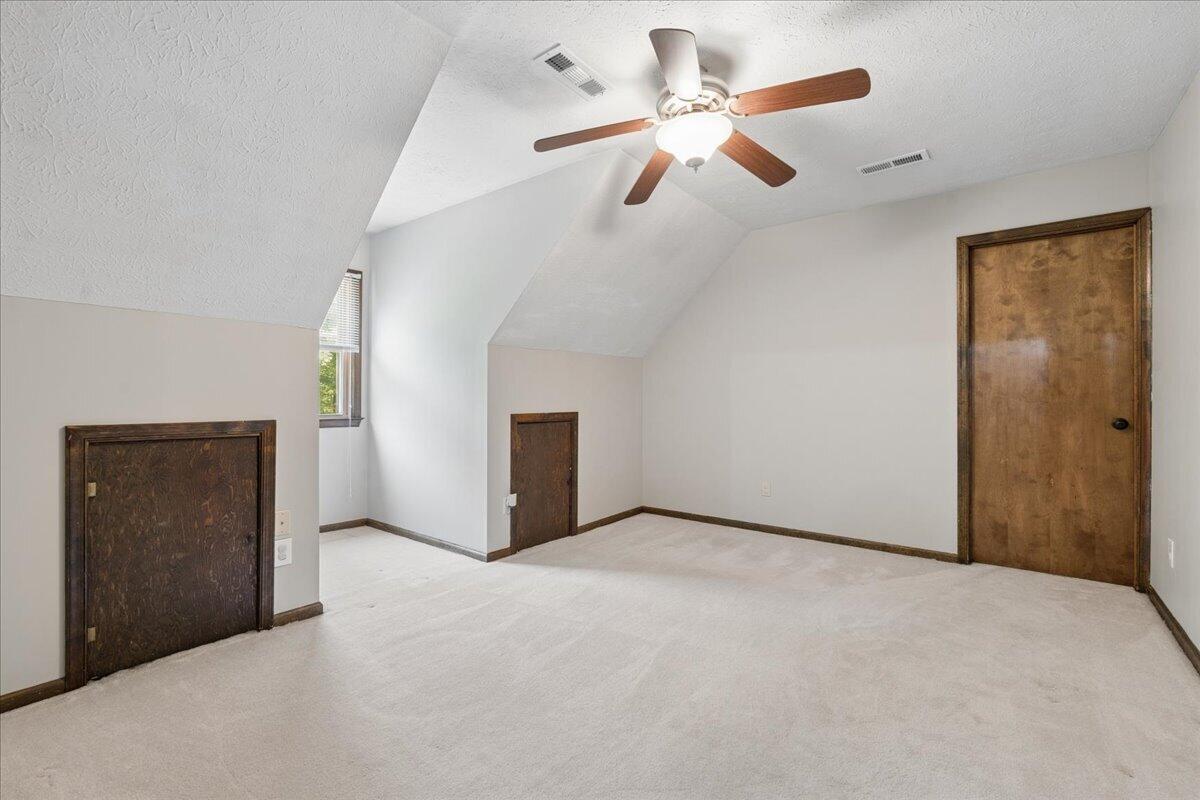 431 Langdon Road Evington, VA 24550 - Photo 25 of 54 a view of an empty room with a ceiling fan