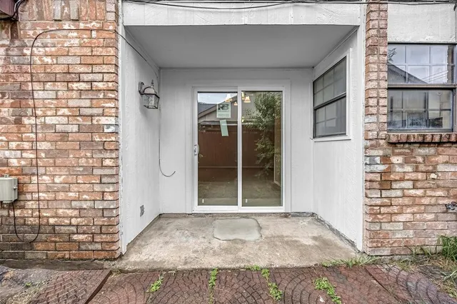a view of entrance gate of a house