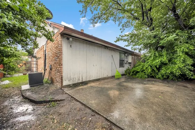 a backyard of a house with seating space