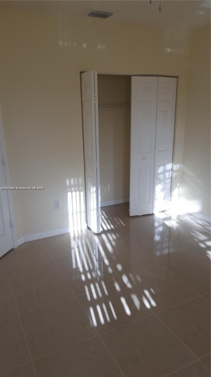 2853 Southwest 85th Avenue, Unit 103 Miramar, FL 33025 - Photo 12 of 20 a view of empty room