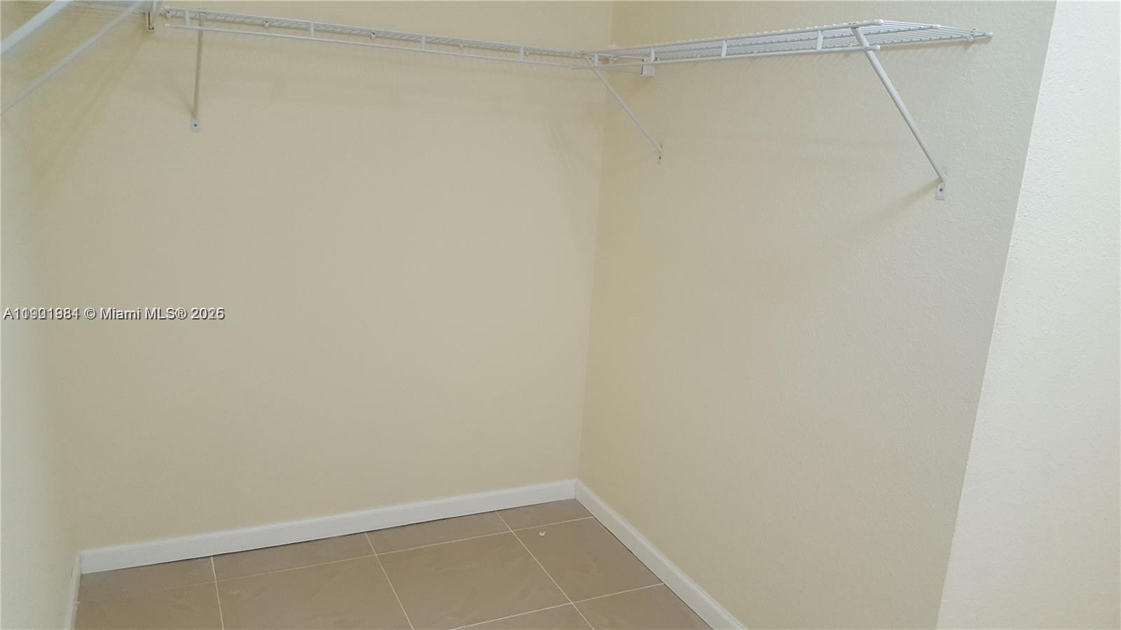2853 Southwest 85th Avenue, Unit 103 Miramar, FL 33025 - Photo 9 of 20 a view of small space with racks on the wall