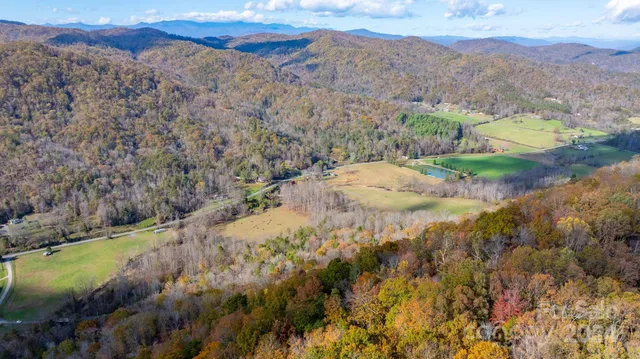 a view of mountains and valleys