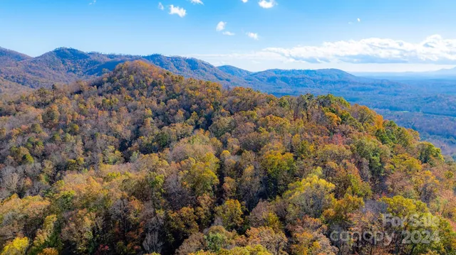 a view of mountains and valleys