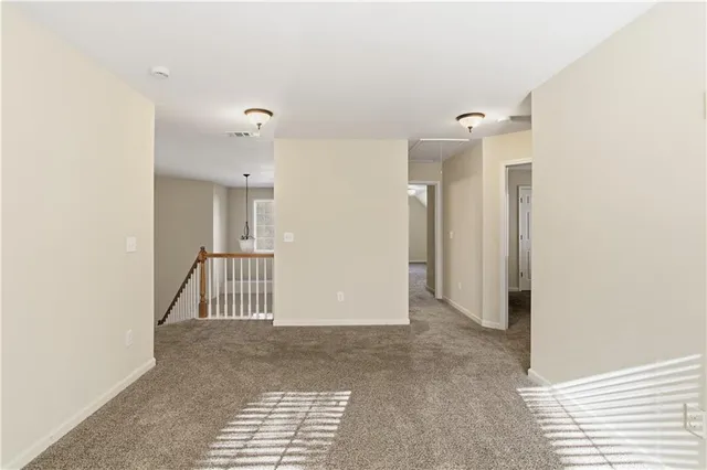 a view of a hallway with entryway