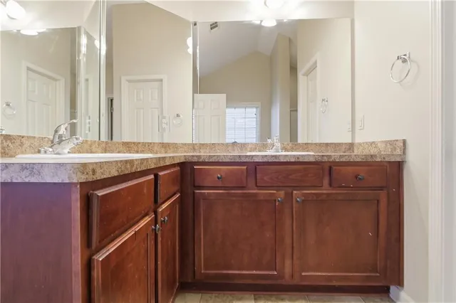 a white bath tub with a shower