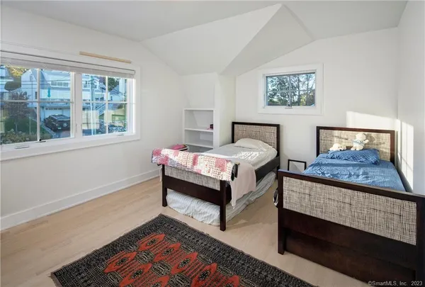 a bed room with a bed and a couch