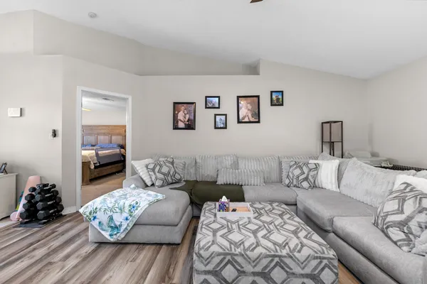 a living room with furniture and a couch