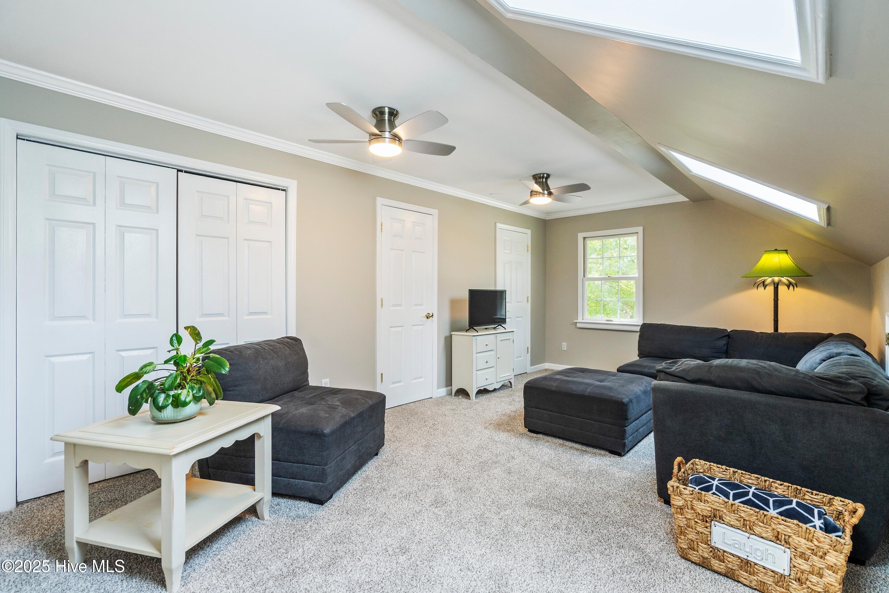 1020 Cordgrass Road Hampstead, NC 28443 - Photo 26 of 65 Bonus room with new carpet and paint, 3 walk in storage closets
