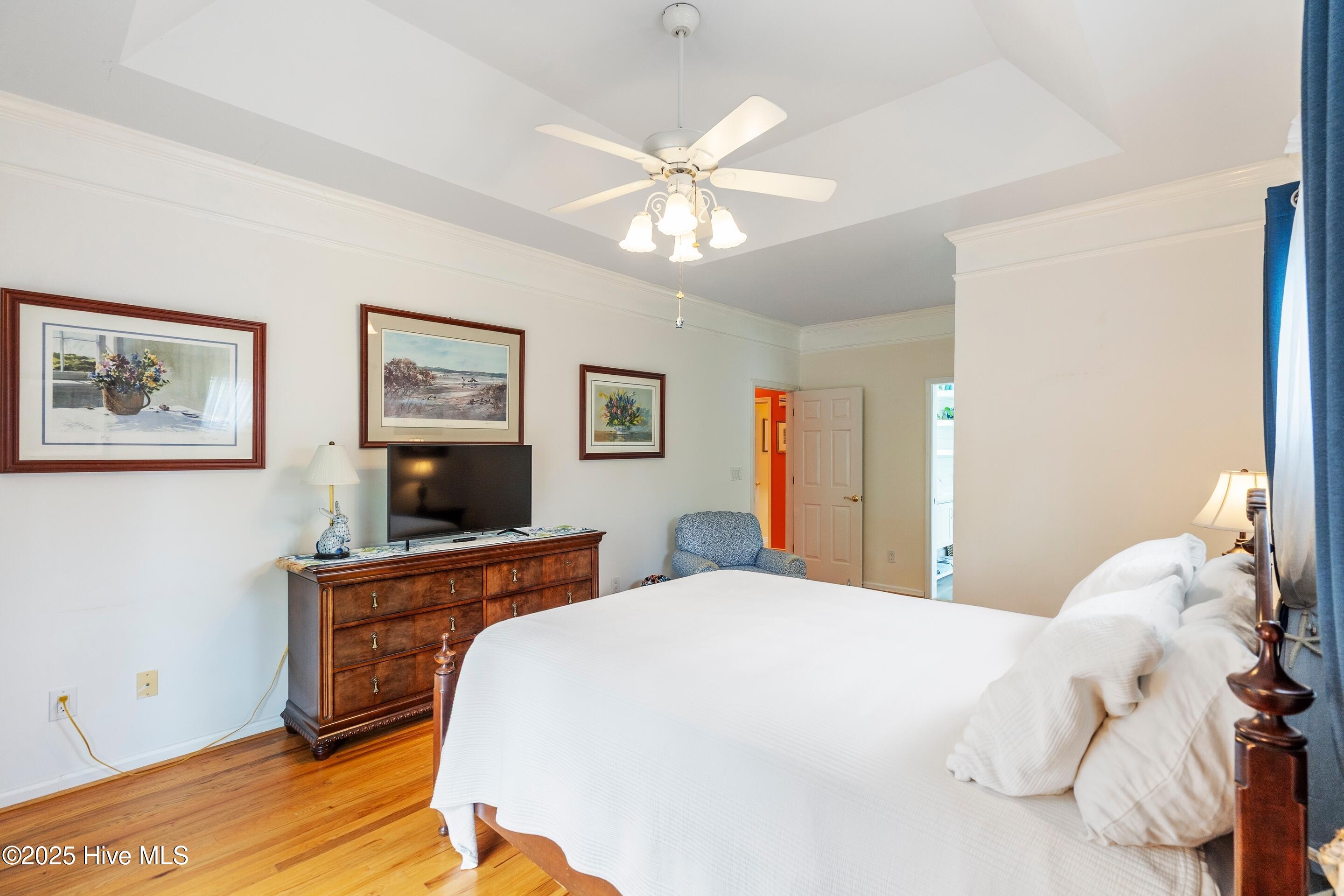 1020 Cordgrass Road Hampstead, NC 28443 - Photo 29 of 65 Master bedroom with deck access, vaulted ceiling