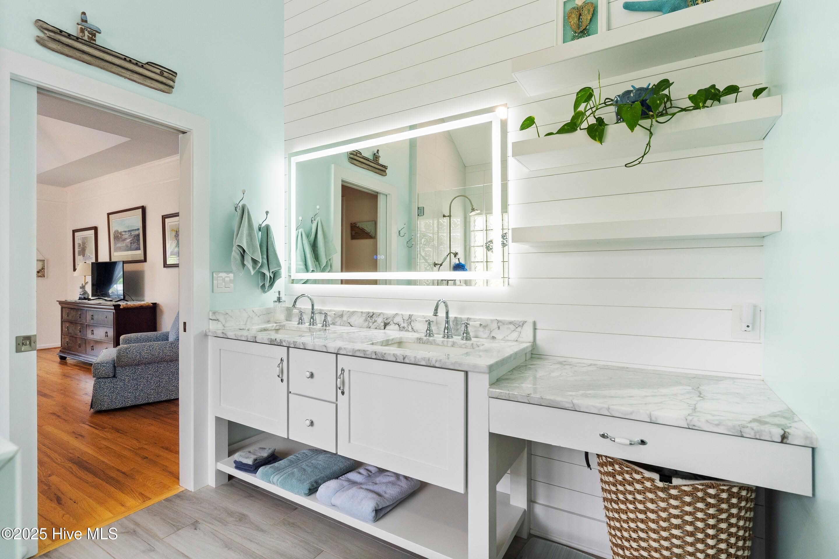 1020 Cordgrass Road Hampstead, NC 28443 - Photo 32 of 65 Recently updated master bath with marble countertops and LED mirror
