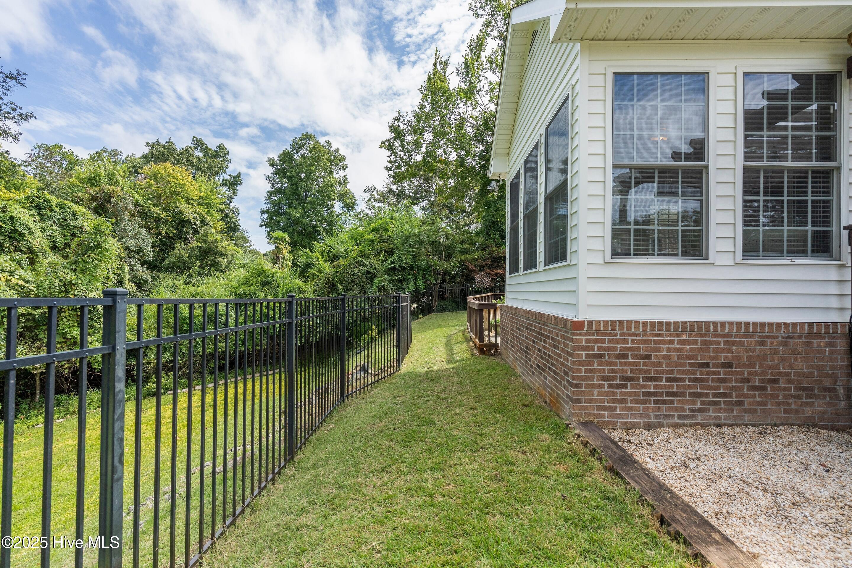 1020 Cordgrass Road Hampstead, NC 28443 - Photo 49 of 65 Fully fenced backyard for your furry friends