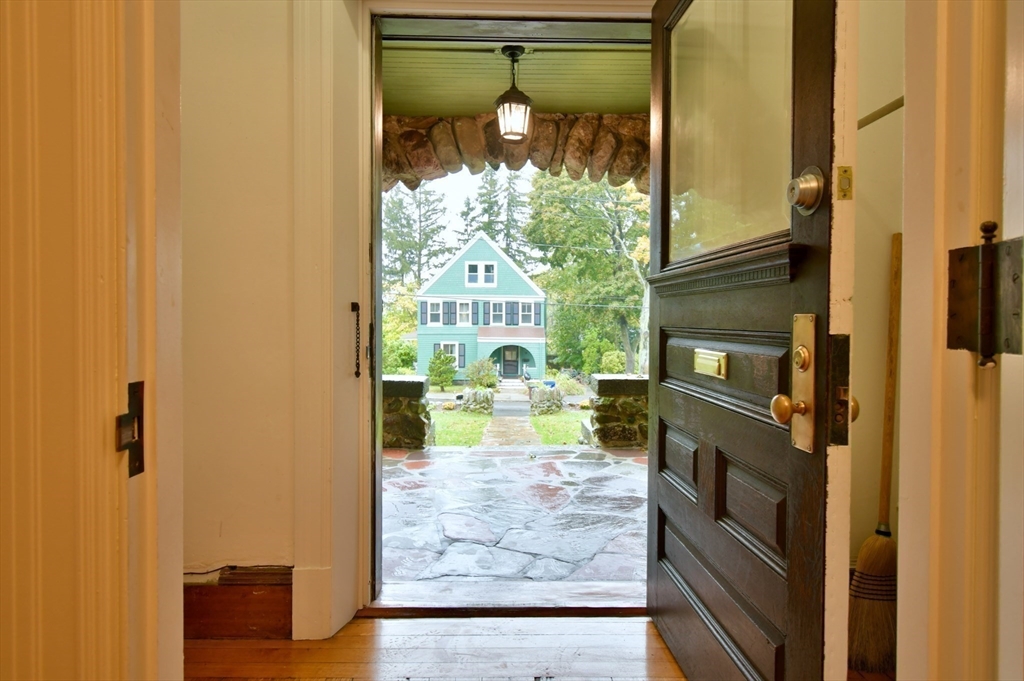 141 Beacon Street Boston, MA 02136 - Photo 5 of 40 a view of a living room with a fireplace
