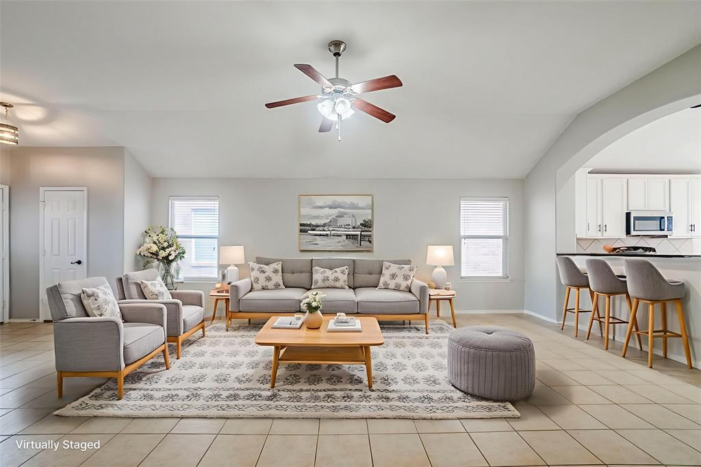 1109 Johnson City Avenue Forney, TX 75126 - Photo 4 of 40 a living room with furniture and a large window