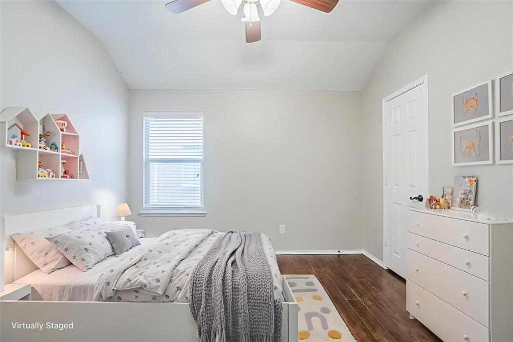 1109 Johnson City Avenue Forney, TX 75126 - Photo 8 of 40 a bedroom with a bed and a window