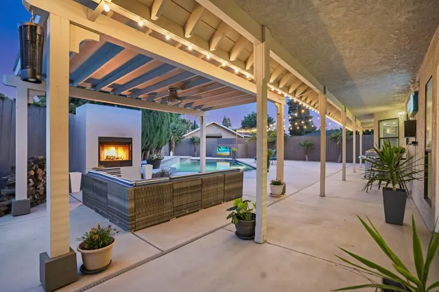 a outdoor space with lots of furniture and a potted plant