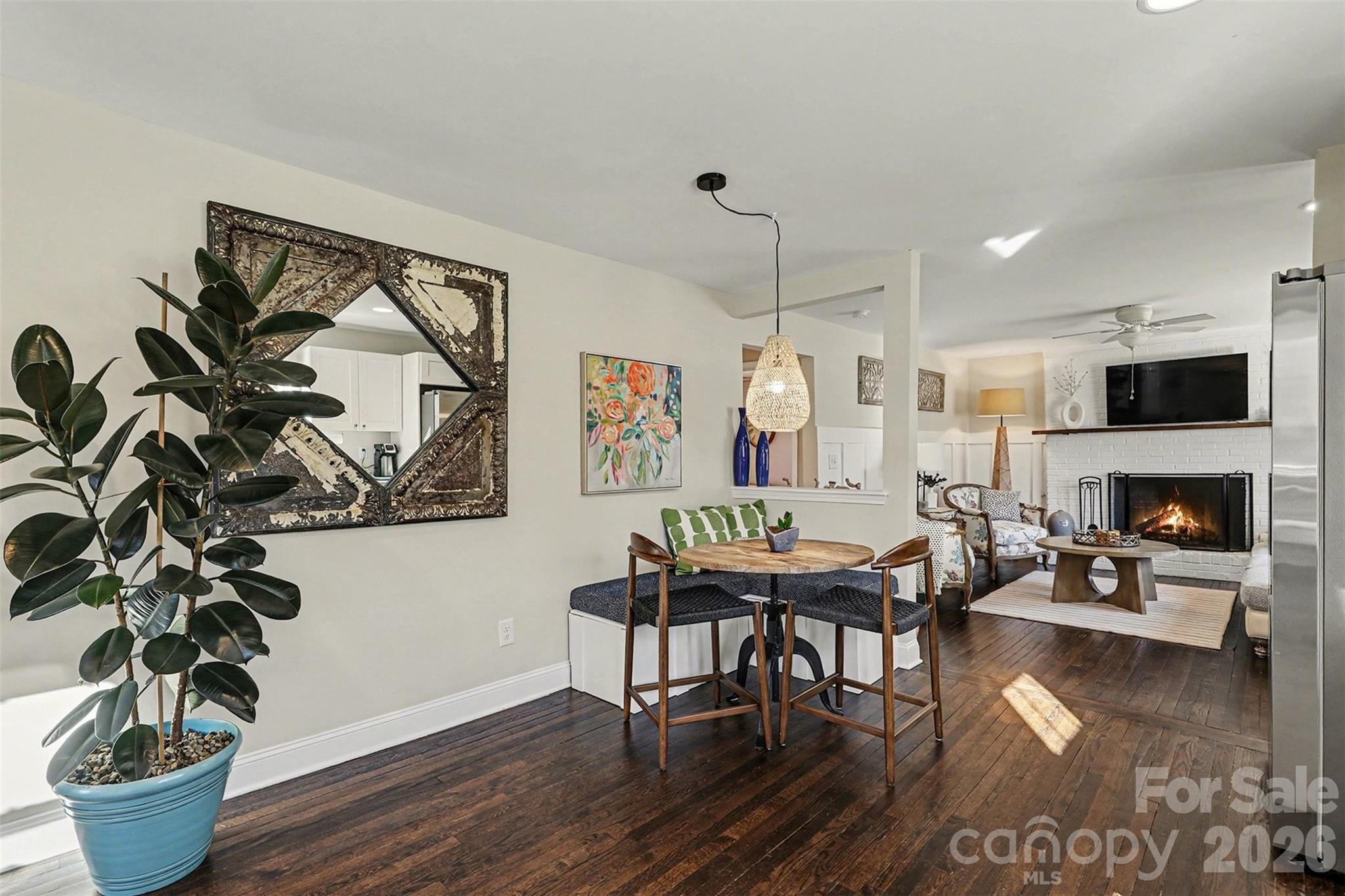 1760 Shearers Road Davidson, NC 28036 - Photo 7 of 18 a living room with furniture and a wooden floor