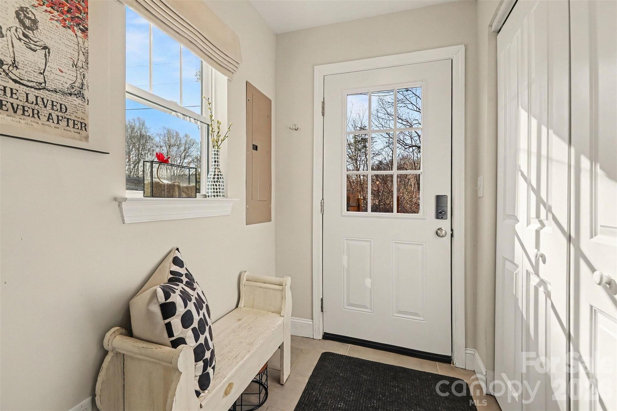 1760 Shearers Road Davidson, NC 28036 - Photo 9 of 18 a living room with furniture and a window
