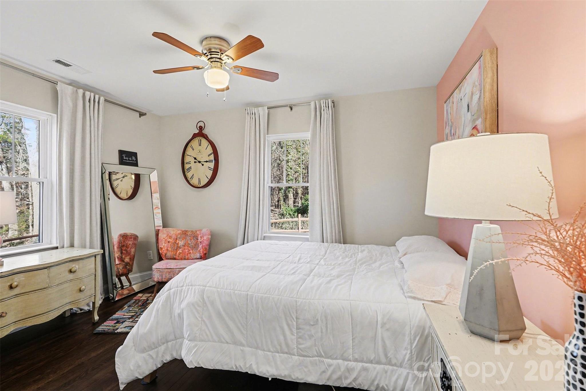 1760 Shearers Road Davidson, NC 28036 - Photo 10 of 18 a bedroom with a bed and a window