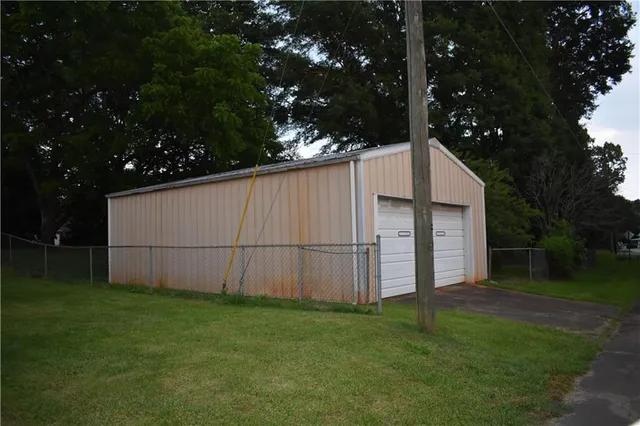 a house view with a backyard space